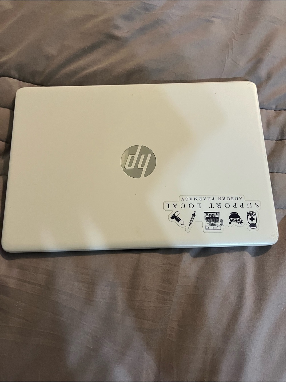 HP White Laptop with Silver Logo